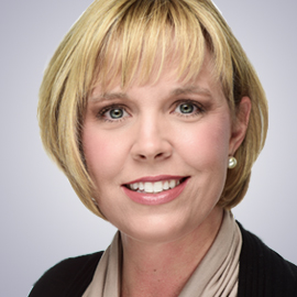 headshot of Ann Regan, Principal at Gilead Group