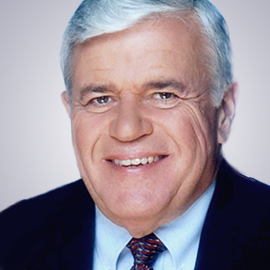 Headshot of Howard Wood, Chairman Chairman of Gilead Group